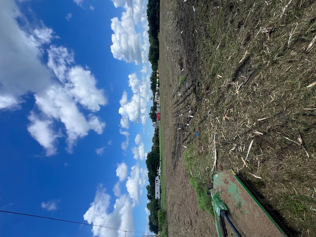 CX3 bush hogging on commercial acreage